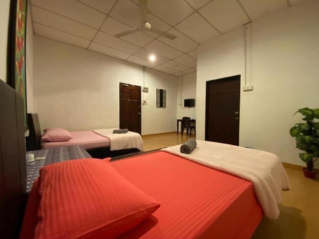 Kencana Guest House パンタイ・サナング エクステリア 写真